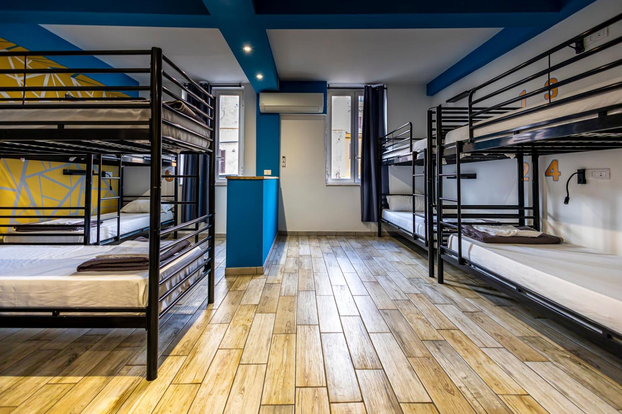 Cama en habitación compartida mixta de 8 camas